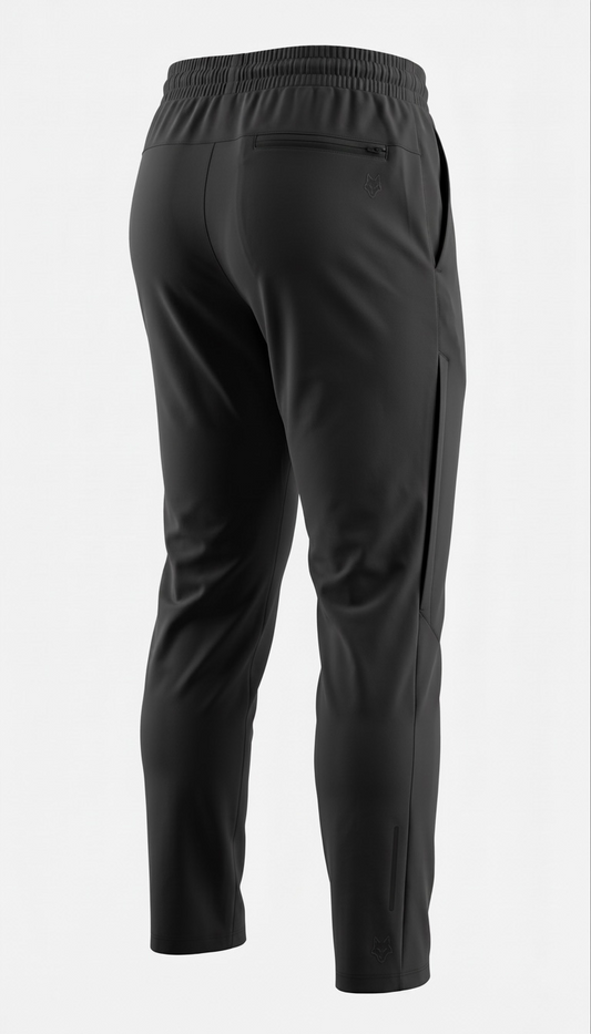 SAVAG3 black athletic training pants with elastic waistband, zip pocket, and reflective detailing.