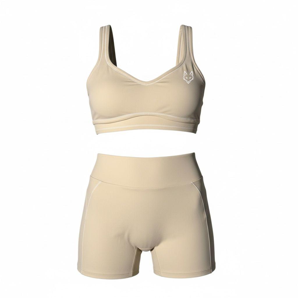 Woman's SAVAG3 HERA™ premium activewear set featuring a performance sports bra and high-waisted shorts designed for gym workouts, Pilates, yoga, and everyday wear.