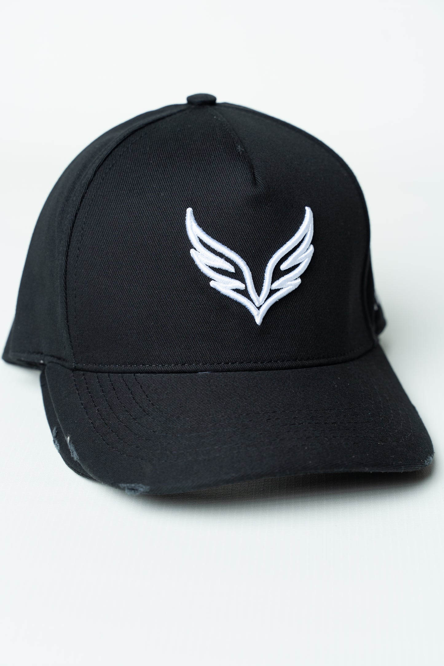 Black SAVAG3 Vintage Cotton Cap featuring an embroidered wolf logo and distressed curved brim