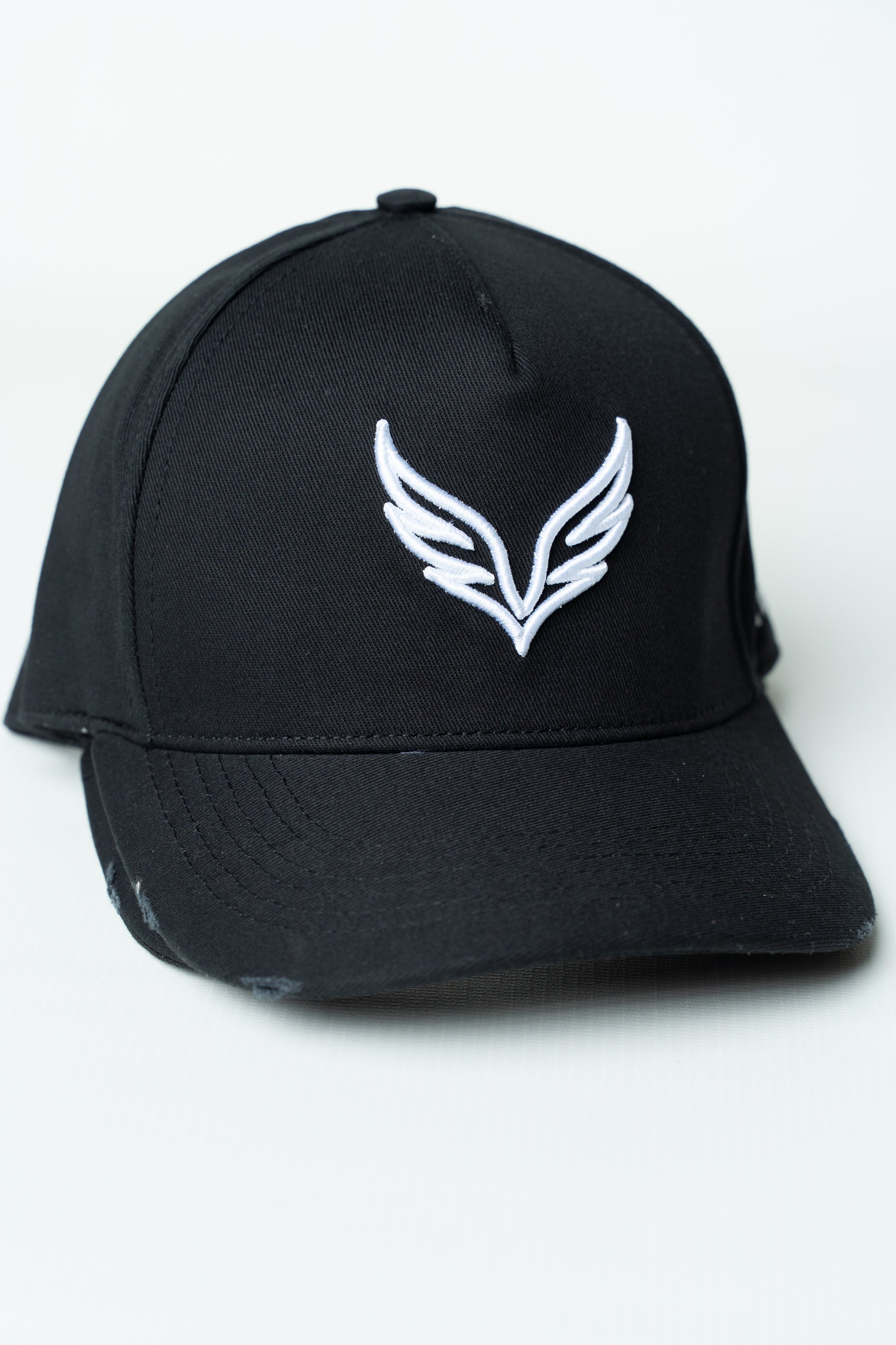 Black SAVAG3 Vintage Cotton Cap featuring an embroidered wolf logo and distressed curved brim