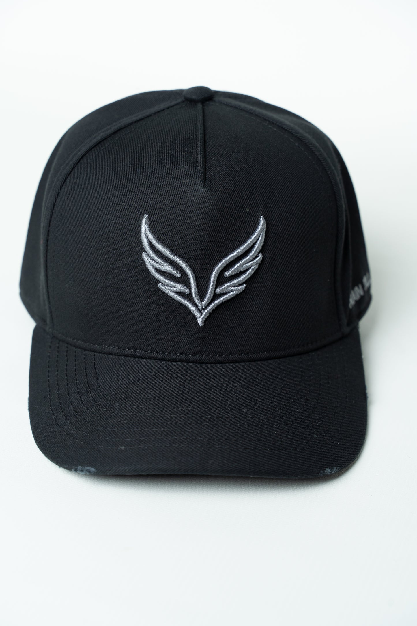 Black SAVAG3 Vintage Cotton Cap featuring an embroidered wolf logo and distressed curved brim