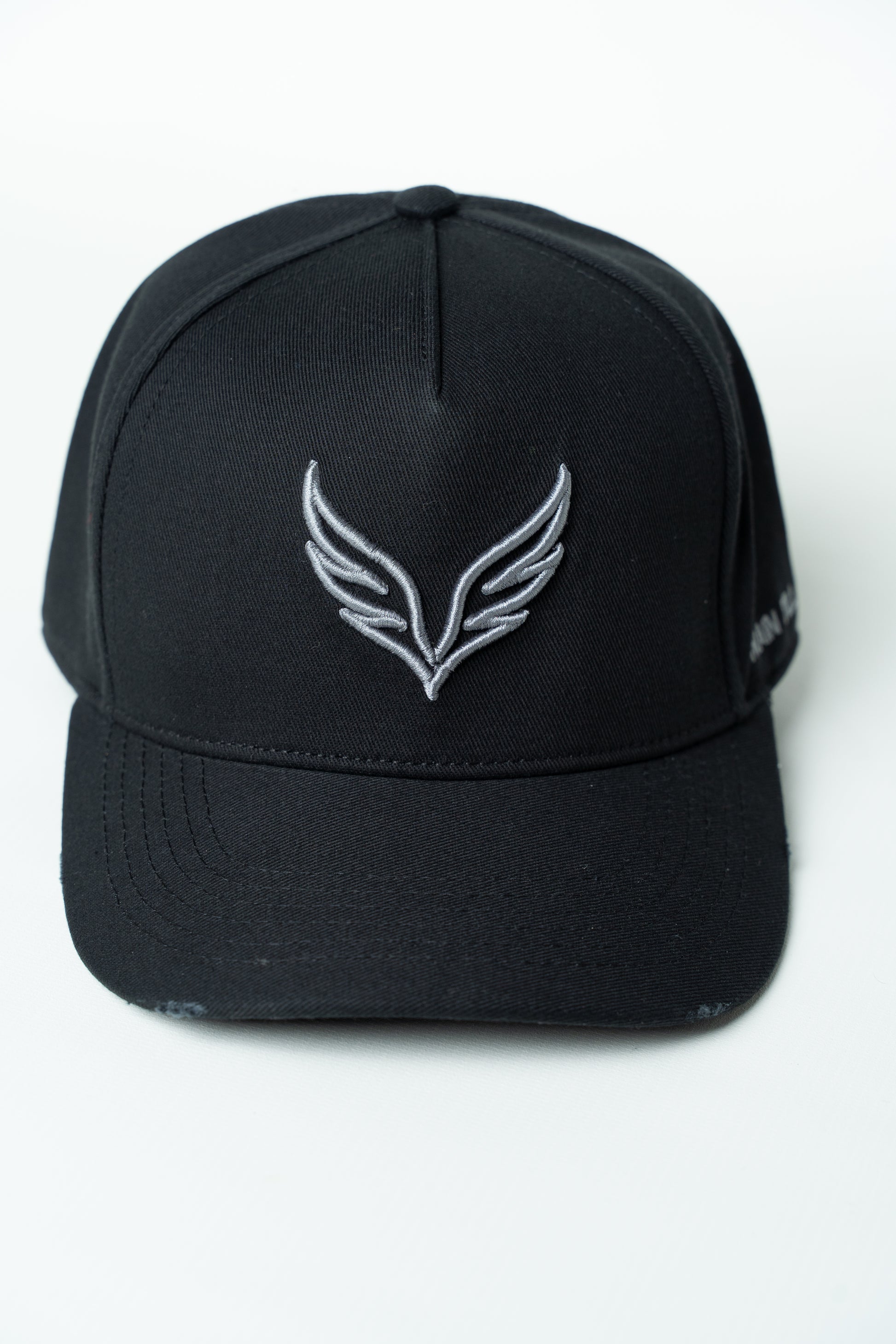 Black SAVAG3 Vintage Cotton Cap featuring an embroidered wolf logo and distressed curved brim